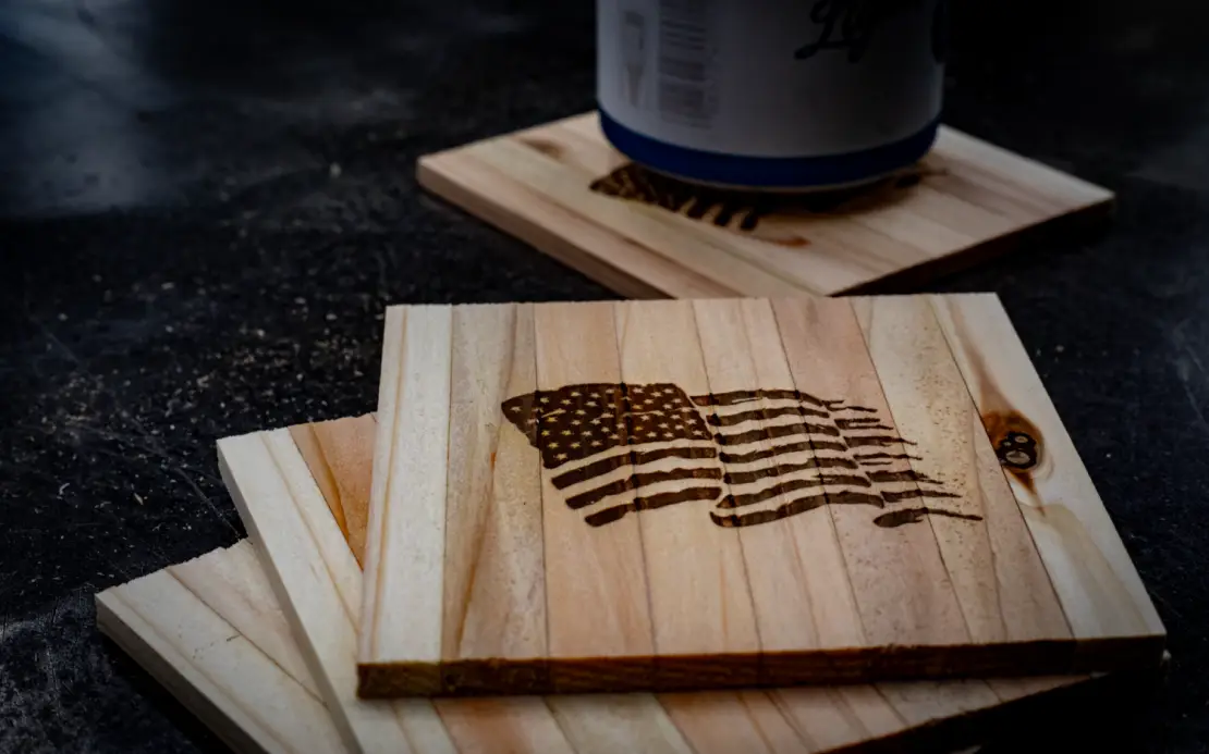 Cedar coasters with American flag branding