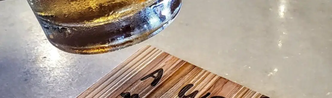 Close-up of heat-branded cedar coaster detail